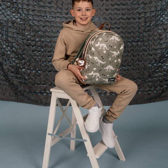 Kinderrucksack 25x35cm mit Dino-Muster in Grün - leder-accessoires.com